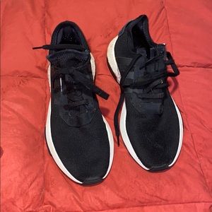 Black Adidas sneakers